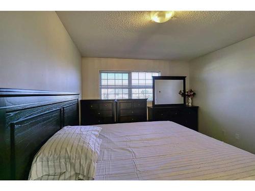 250 Coral Keys Court Ne, Calgary, AB - Indoor Photo Showing Bedroom