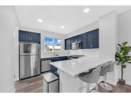 221 Belmont Street Sw, Calgary, AB - Indoor Photo Showing Kitchen With Upgraded Kitchen