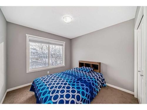 453 Copperpond Landing Se, Calgary, AB - Indoor Photo Showing Bedroom