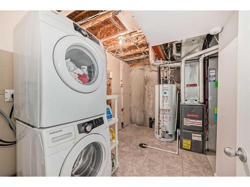 453 Copperpond Landing Se, Calgary, AB - Indoor Photo Showing Laundry Room