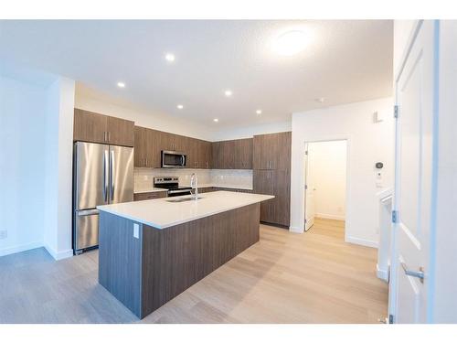 333 Baneberry Way Sw, Airdrie, AB - Indoor Photo Showing Kitchen