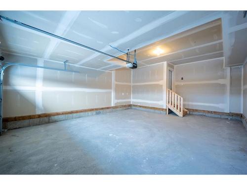 333 Baneberry Way Sw, Airdrie, AB - Indoor Photo Showing Garage