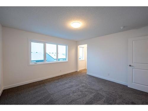 333 Baneberry Way Sw, Airdrie, AB - Indoor Photo Showing Other Room