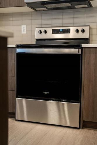 333 Baneberry Way Sw, Airdrie, AB - Indoor Photo Showing Kitchen