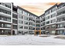 2411-111 Wolf Creek Drive Se, Calgary, AB  - Outdoor With Balcony With Facade 