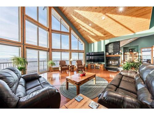 642157 72 Street East, Rural Foothills County, AB - Indoor Photo Showing Living Room With Fireplace