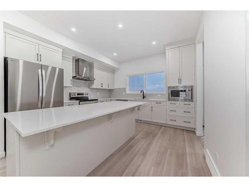 260 Belmont Way Sw, Calgary, AB - Indoor Photo Showing Kitchen With Upgraded Kitchen