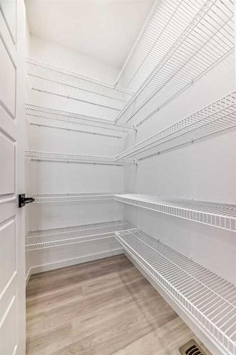 260 Belmont Way Sw, Calgary, AB - Indoor With Storage