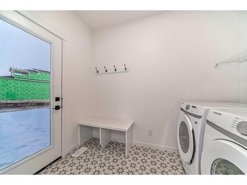 260 Belmont Way Sw, Calgary, AB - Indoor Photo Showing Laundry Room