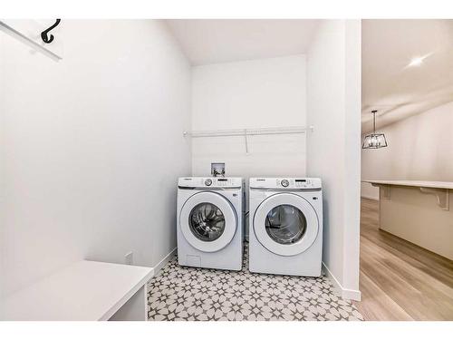 260 Belmont Way Sw, Calgary, AB - Indoor Photo Showing Laundry Room