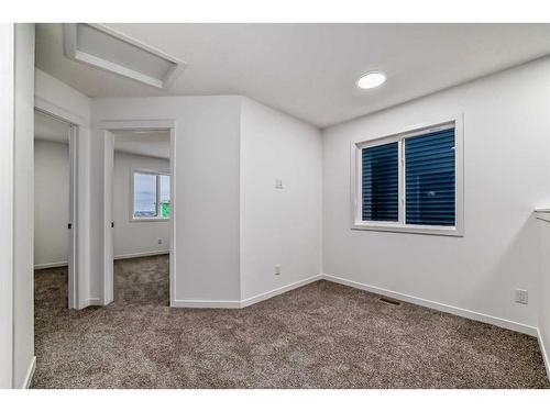 260 Belmont Way Sw, Calgary, AB - Indoor Photo Showing Other Room