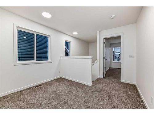 260 Belmont Way Sw, Calgary, AB - Indoor Photo Showing Other Room