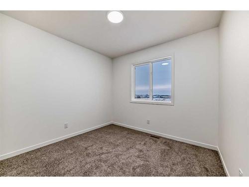 260 Belmont Way Sw, Calgary, AB - Indoor Photo Showing Other Room