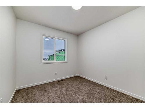 260 Belmont Way Sw, Calgary, AB - Indoor Photo Showing Other Room