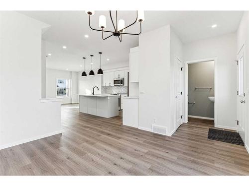 89 Riversong Boulevard, Cochrane, AB - Indoor Photo Showing Kitchen