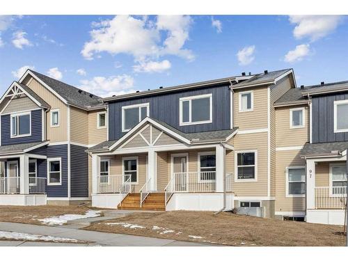 89 Riversong Boulevard, Cochrane, AB - Outdoor With Facade