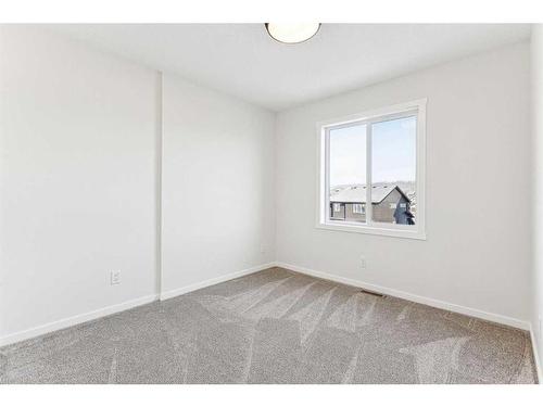 89 Riversong Boulevard, Cochrane, AB - Indoor Photo Showing Other Room