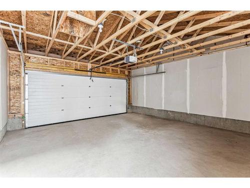 89 Riversong Boulevard, Cochrane, AB - Indoor Photo Showing Garage