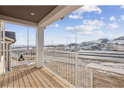 89 Riversong Boulevard, Cochrane, AB - Outdoor With Deck Patio Veranda With View With Exterior