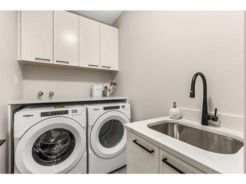 210 Blackstone Road, Balzac, AB - Indoor Photo Showing Laundry Room