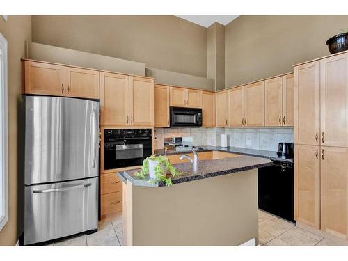 19 Tucker Circle, Okotoks, AB - Indoor Photo Showing Kitchen