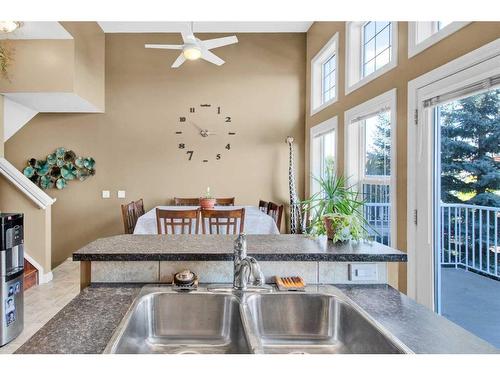 19 Tucker Circle, Okotoks, AB - Indoor Photo Showing Kitchen With Double Sink