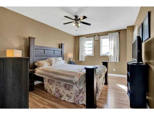 19 Tucker Circle, Okotoks, AB - Indoor Photo Showing Bedroom