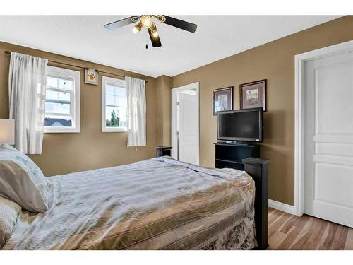 19 Tucker Circle, Okotoks, AB - Indoor Photo Showing Bedroom