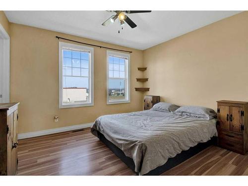 19 Tucker Circle, Okotoks, AB - Indoor Photo Showing Bedroom