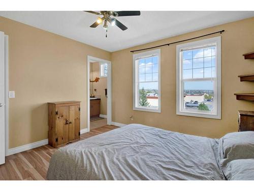 19 Tucker Circle, Okotoks, AB - Indoor Photo Showing Bedroom