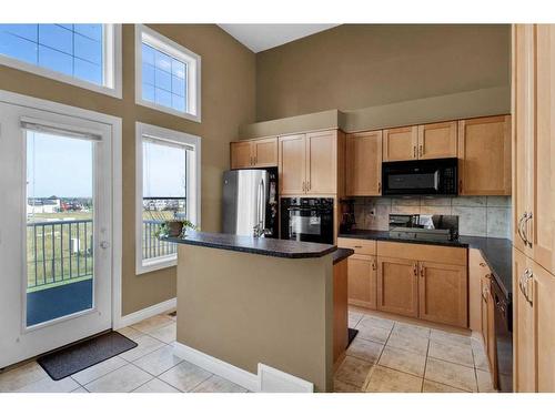 19 Tucker Circle, Okotoks, AB - Indoor Photo Showing Kitchen