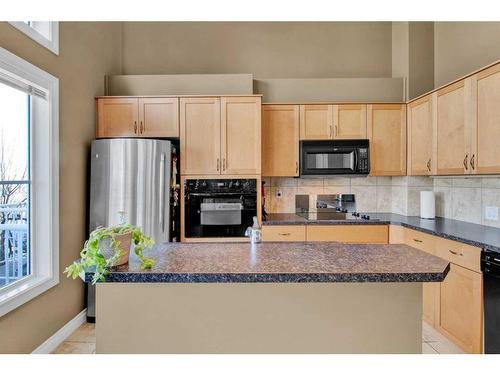 19 Tucker Circle, Okotoks, AB - Indoor Photo Showing Kitchen