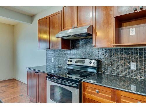 159 Cougarstone Court Sw, Calgary, AB - Indoor Photo Showing Kitchen