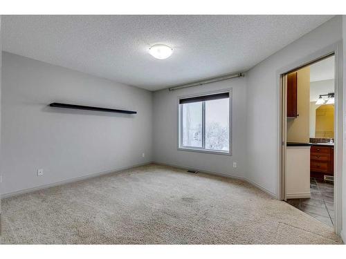 159 Cougarstone Court Sw, Calgary, AB - Indoor Photo Showing Other Room