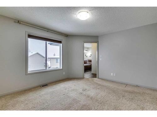 159 Cougarstone Court Sw, Calgary, AB - Indoor Photo Showing Other Room