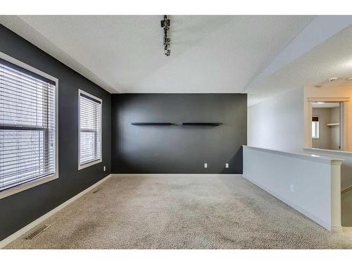 159 Cougarstone Court Sw, Calgary, AB - Indoor Photo Showing Other Room