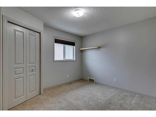 159 Cougarstone Court Sw, Calgary, AB - Indoor Photo Showing Other Room