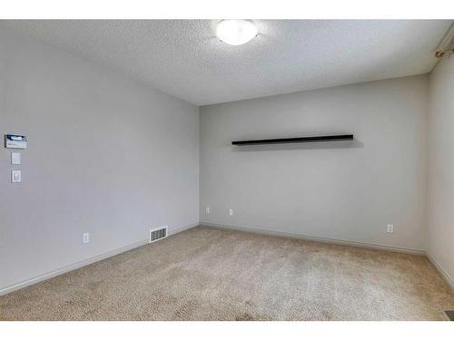 159 Cougarstone Court Sw, Calgary, AB - Indoor Photo Showing Other Room