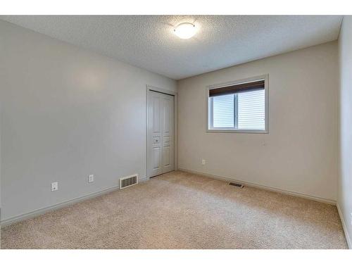 159 Cougarstone Court Sw, Calgary, AB - Indoor Photo Showing Other Room