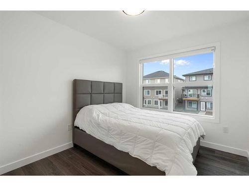 64 Heritage Lane, Cochrane, AB - Indoor Photo Showing Bedroom