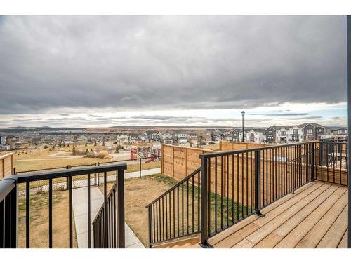 64 Heritage Lane, Cochrane, AB - Outdoor With Deck Patio Veranda With View