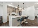 64 Heritage Lane, Cochrane, AB  - Indoor Photo Showing Kitchen With Upgraded Kitchen 