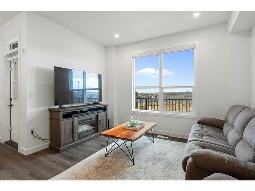 64 Heritage Lane, Cochrane, AB - Indoor Photo Showing Living Room