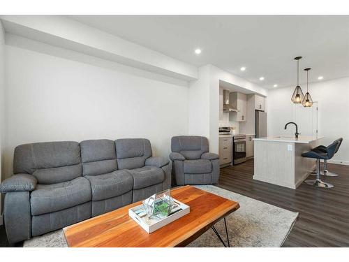 64 Heritage Lane, Cochrane, AB - Indoor Photo Showing Living Room