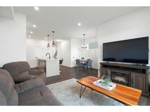 64 Heritage Lane, Cochrane, AB - Indoor Photo Showing Living Room