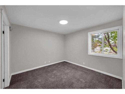 91 Emberdale Way Se, Airdrie, AB - Indoor Photo Showing Other Room