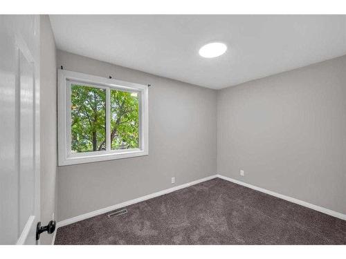 91 Emberdale Way Se, Airdrie, AB - Indoor Photo Showing Other Room