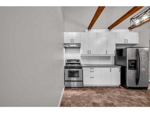 91 Emberdale Way Se, Airdrie, AB - Indoor Photo Showing Kitchen