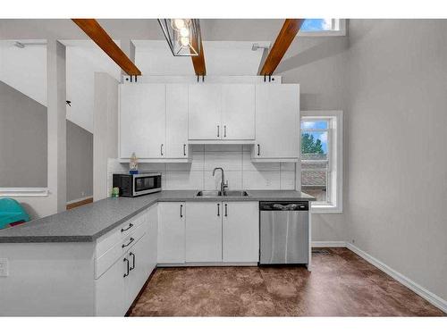 91 Emberdale Way Se, Airdrie, AB - Indoor Photo Showing Kitchen With Double Sink