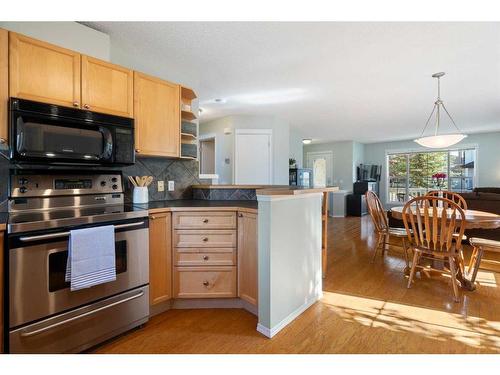 63 Tuscany Springs Rise Nw, Calgary, AB - Indoor Photo Showing Kitchen